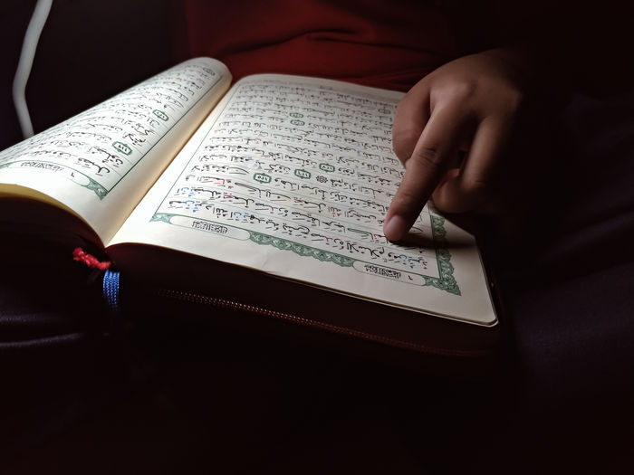 Close up of reading holy quran