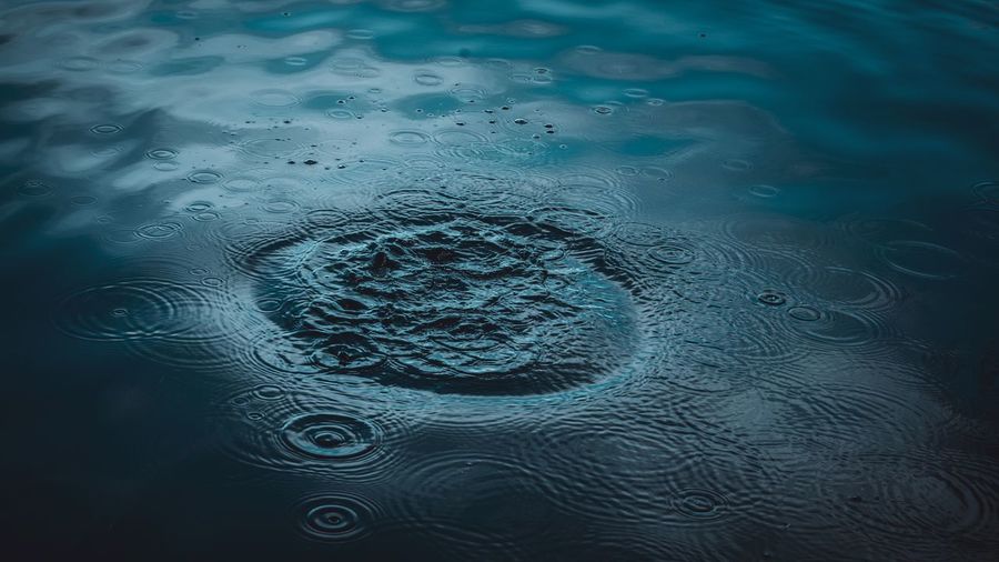 Full frame shot of rippled puddle during rainfall