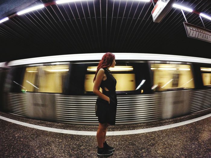 Low angle view of woman in subway
