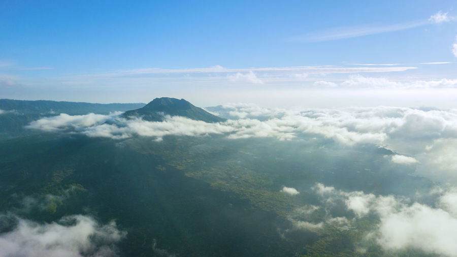 Aerial view of clouds over landscape against sky