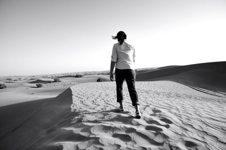 Full length of woman in desert