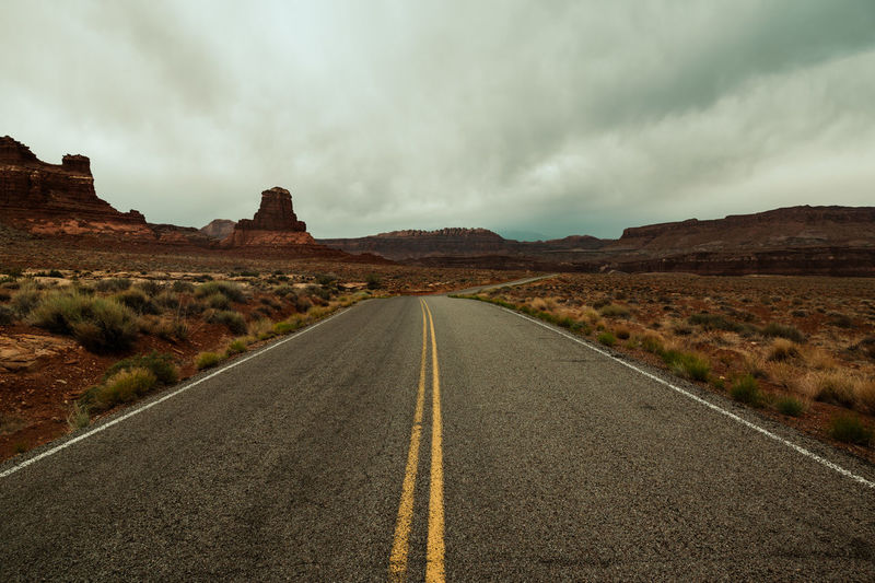 Long road in utah leading to hite marina campground, glen canyon national recreation area.