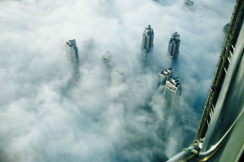 Aerial view of buildings and cloudscape