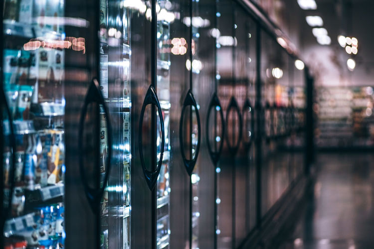 Close-up of glass bottles in store