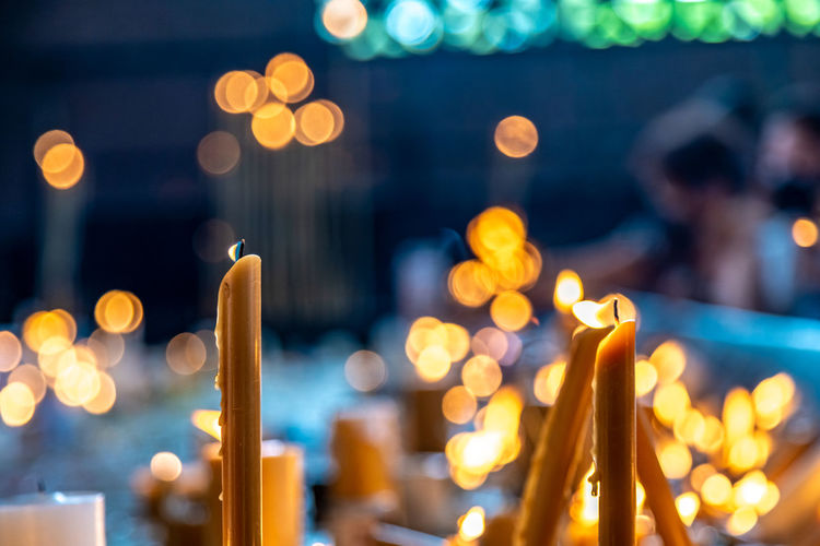 Close-up of illuminated candles