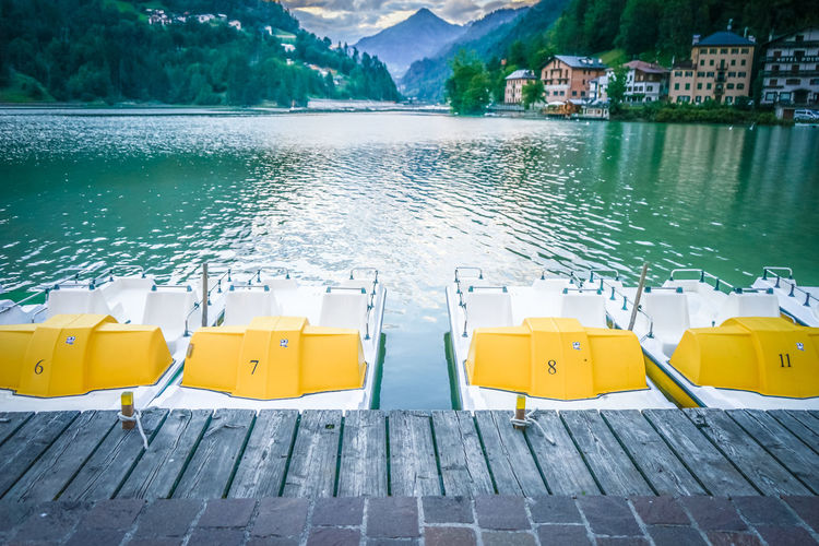 Yellow swimming pool by lake