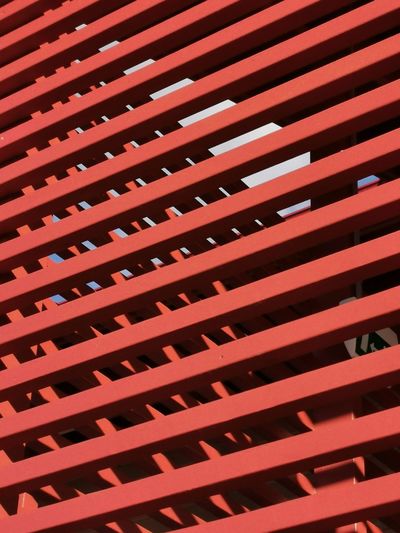 Full frame shot of red blinds