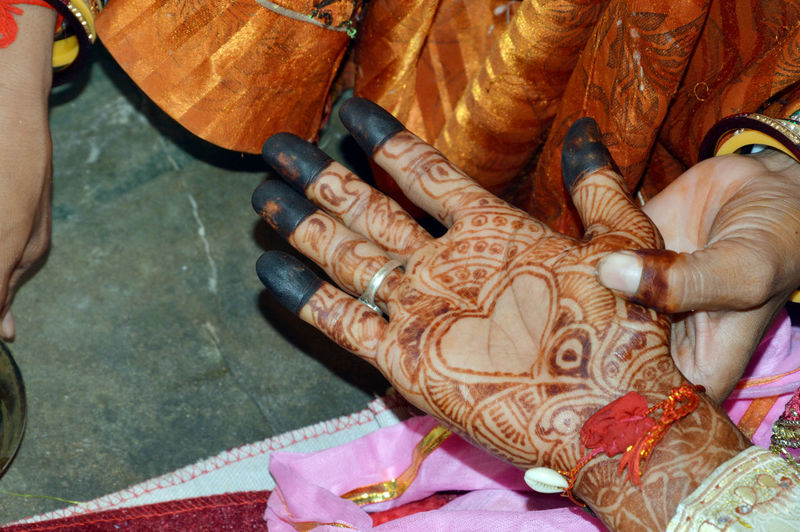 Indian groom henna painted hand