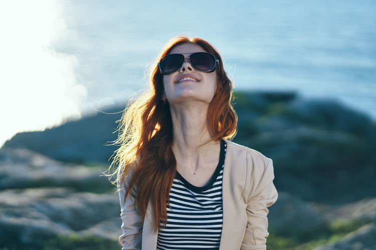 Young woman wearing sunglasses