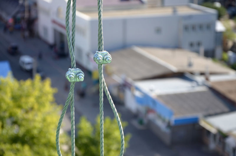 Close-up of chain hanging from metal