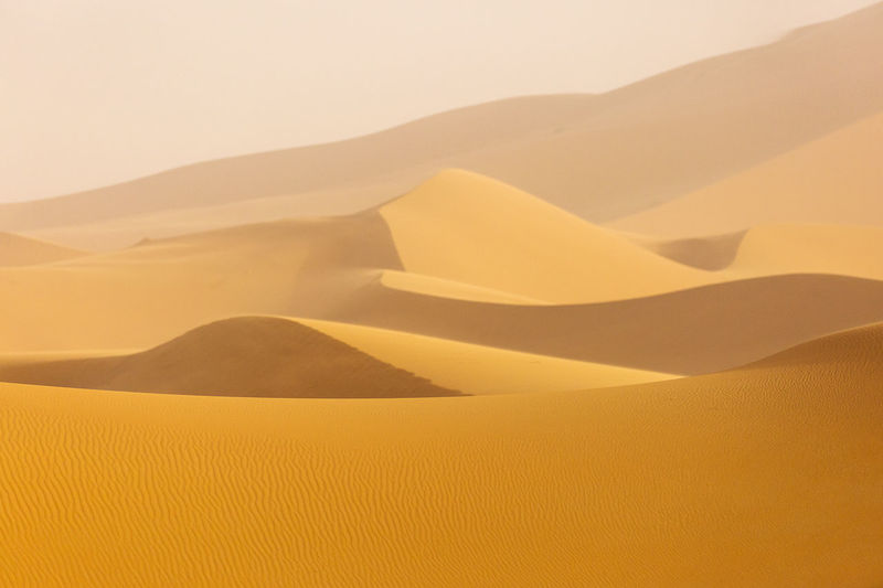 Scenic view of desert against clear sky