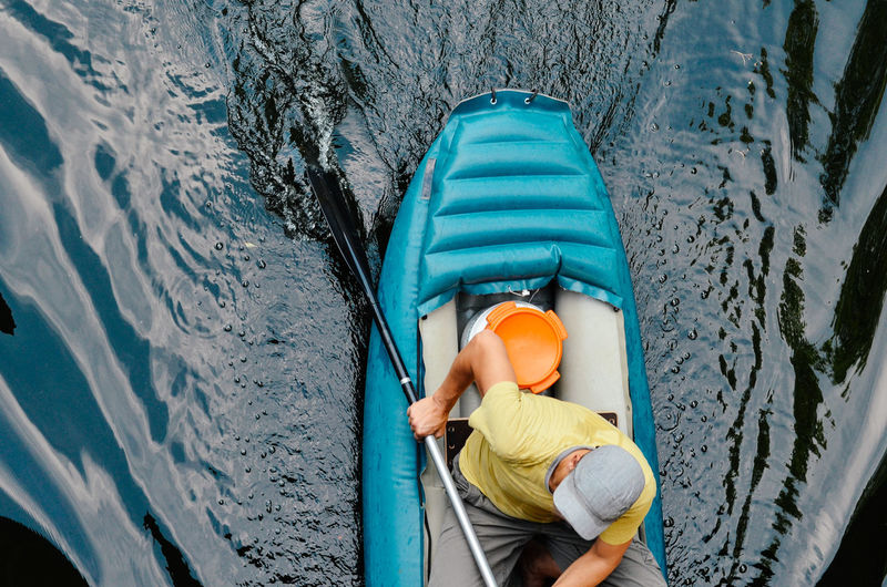 High angle view of man in canoe