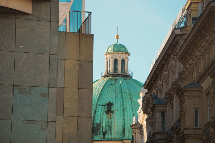 Low angle view of st peters church against sky in city