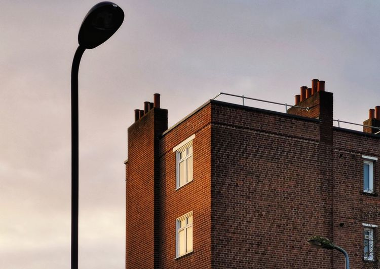 Low angle view of buildings against sky