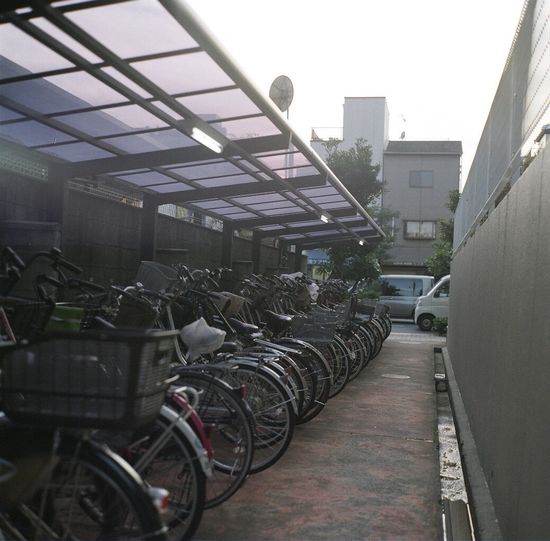 Bicycle parked in front of building