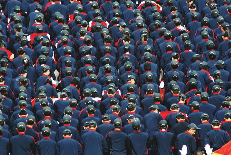 Full frame shot of people standing in blue uniform during celebration