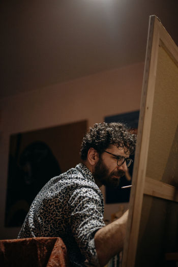 Man looking at camera at home