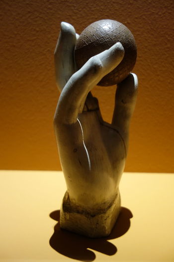 Close-up of statue on table