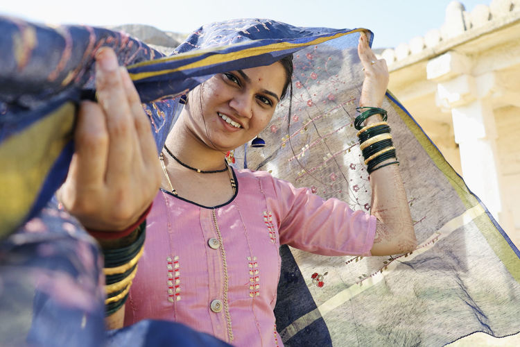 Portrait of young woman wearing salwar kameez