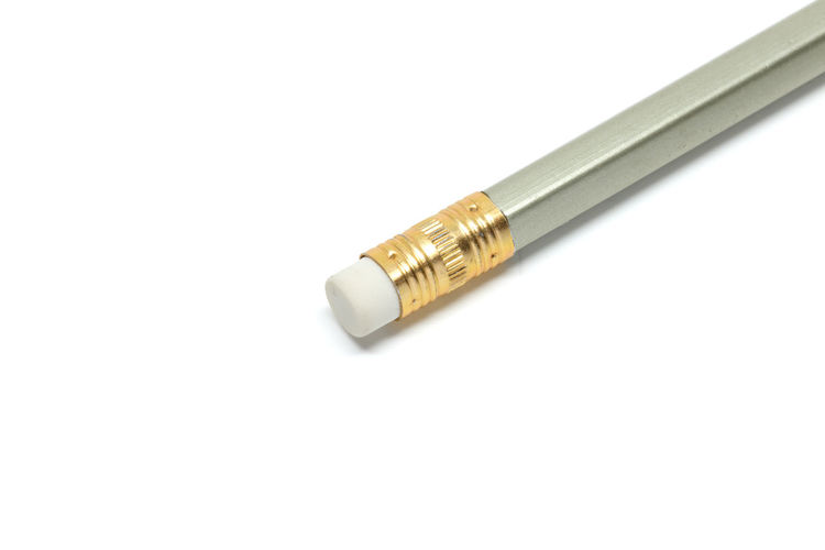 High angle view of pencil against white background