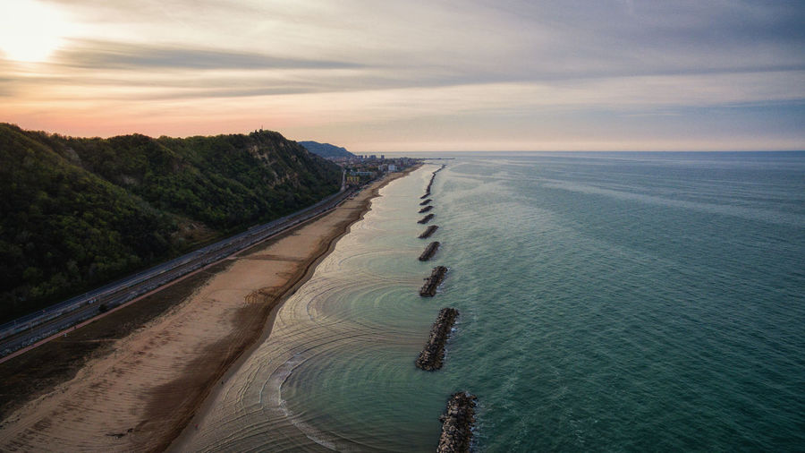 High angle view of sea against sky during sunset