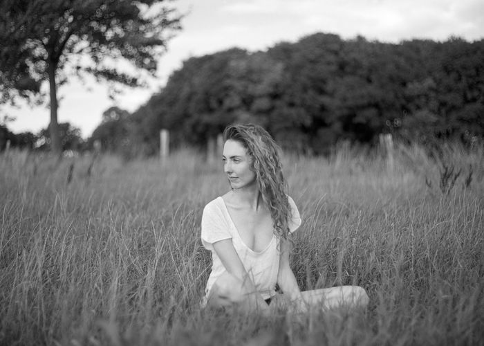 Portrait of woman on field