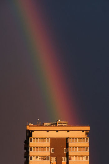 Rainbows are knocked out of the roof of a high-rise building