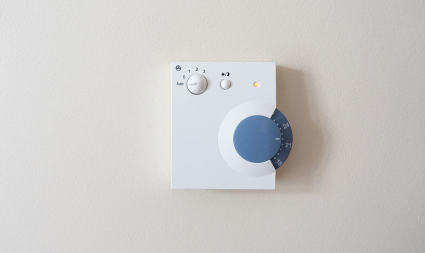 Close-up of camera on wall