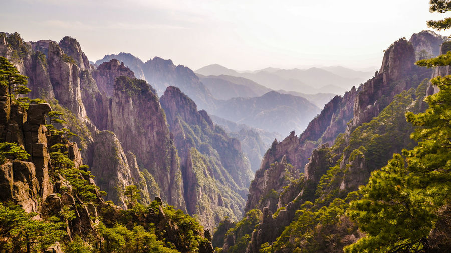 Scenic view of mountain ranges against sky