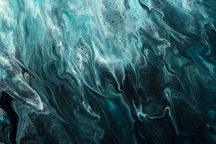 Fluid art. liquid dark turquoise abstract drips and wave. marble effect background or texture