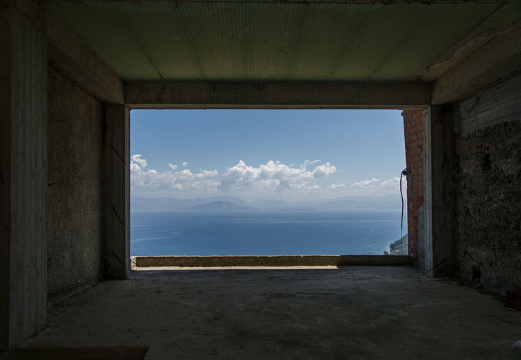 Sea seen through window of building