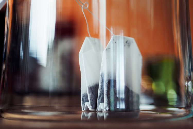 Close-up teabags in glass