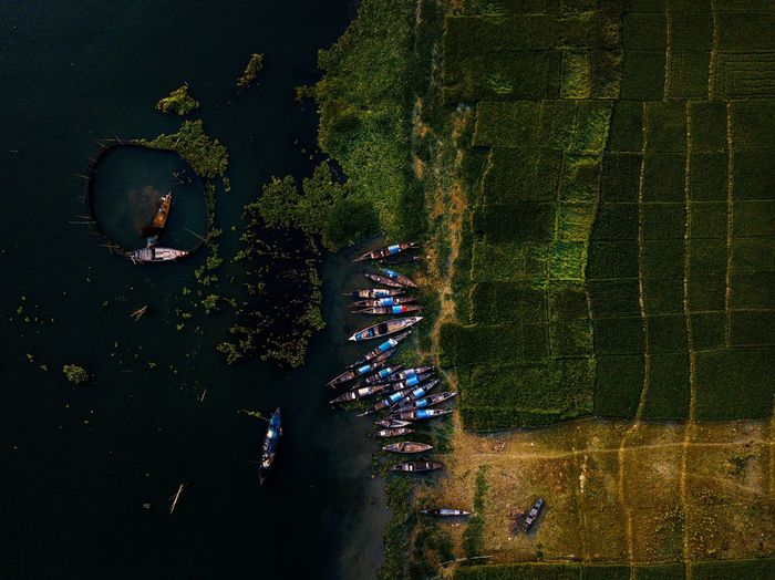 High angle view of boats by lake