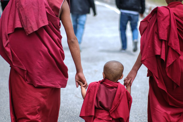 Rear view of monks