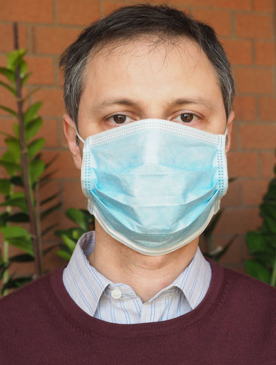 Close-up of man wearing mask