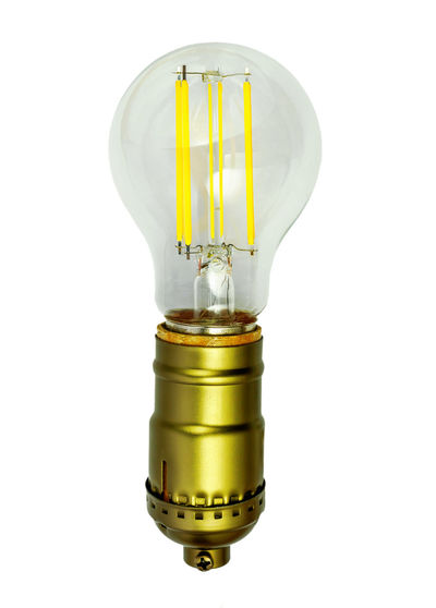 Close-up of light bulb against white background