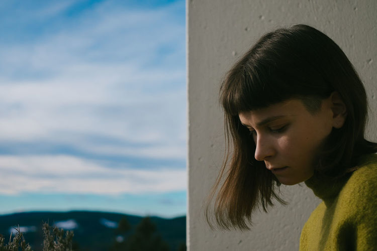 - Into the new sun - Blue Sky Close-up EyeEmNewHere Fresh On Eyeem Lifestyles Natural Nature One Person Outdoors Portrait Portrait Of A Woman Profile Real People Self Portrait Sky And Clouds Springtime Sunlight Wall Wall - Building Feature Woman The Week Of Eyeem Fresh on Market 2017 EyeEm Selects Breathing Space The Week On EyeEm