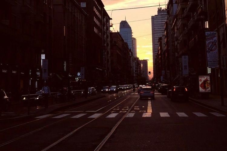 View of city street at dusk