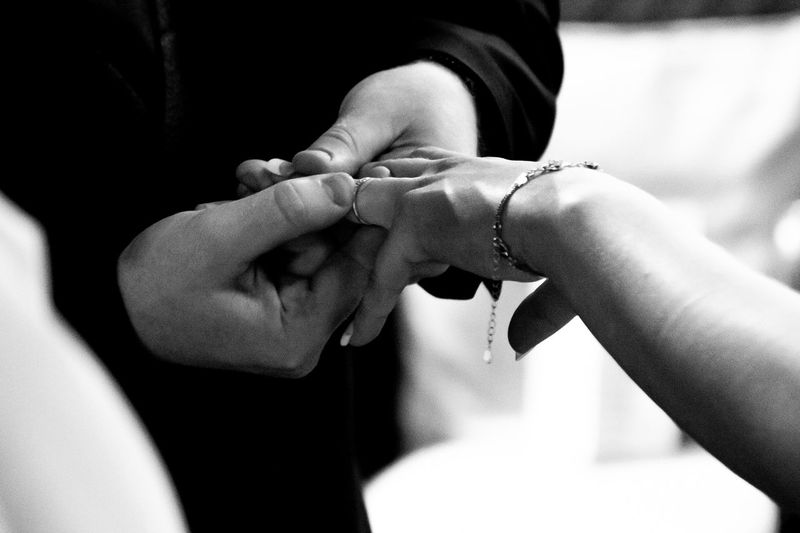Groom giving his ring