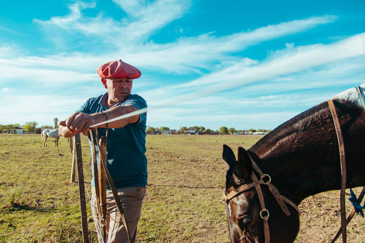 Argentinian farmer and his horse