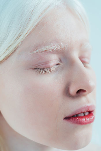 CLOSE-UP PORTRAIT OF WOMAN WITH EYES