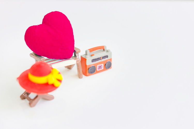 Close-up of multi colored toy on white background