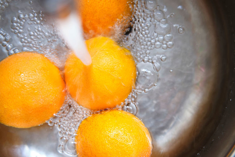 Close-up of oranges in water