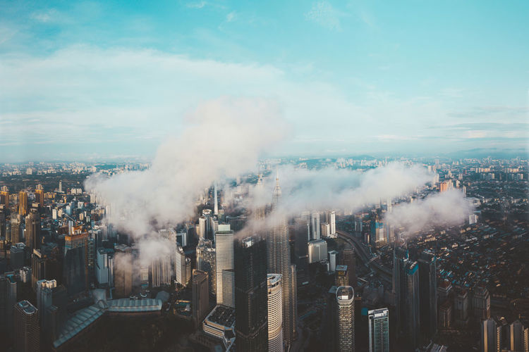 Low level clouds above the city of kuala lumpur, malaysia 
