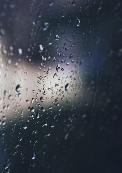 Close-up of water drops on glass window