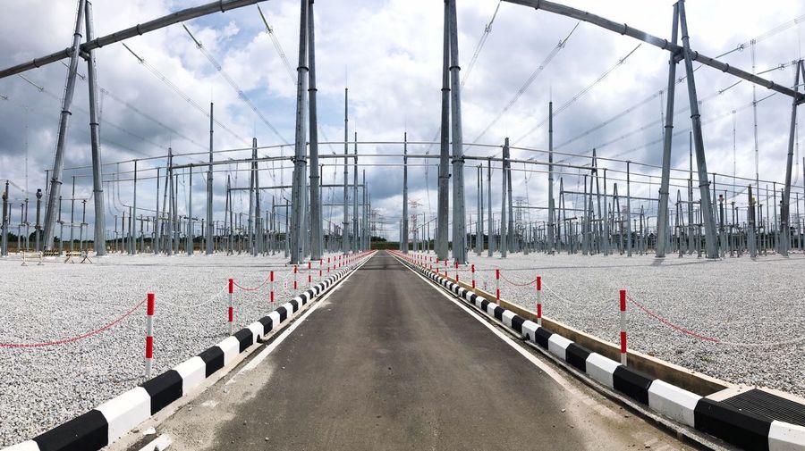Bridge over road against sky