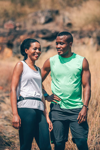 Couple standing on mountain