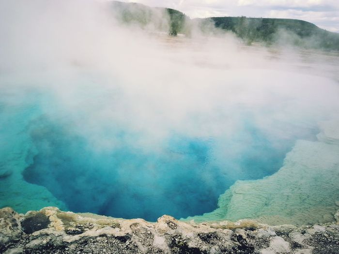 Steam emitting from sapphire pool at yellowstone national park