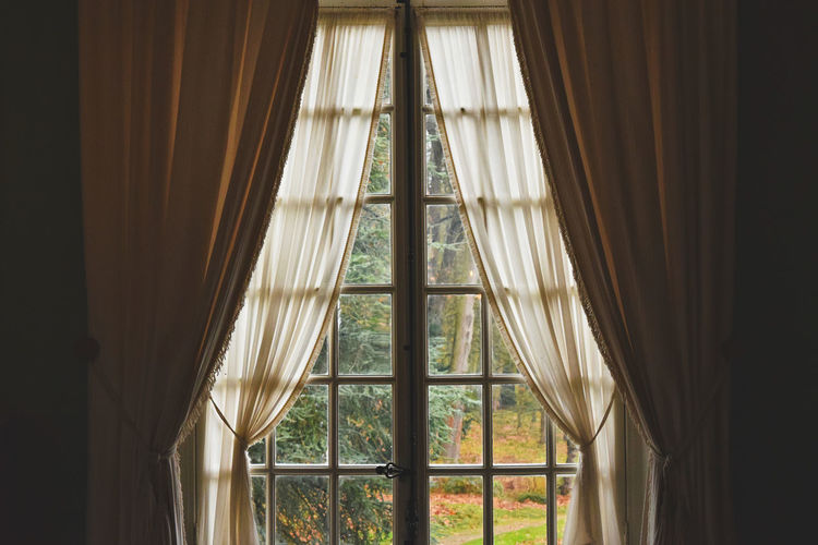 Low angle view of glass window