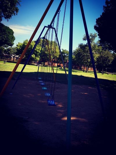 View of empty swing in park